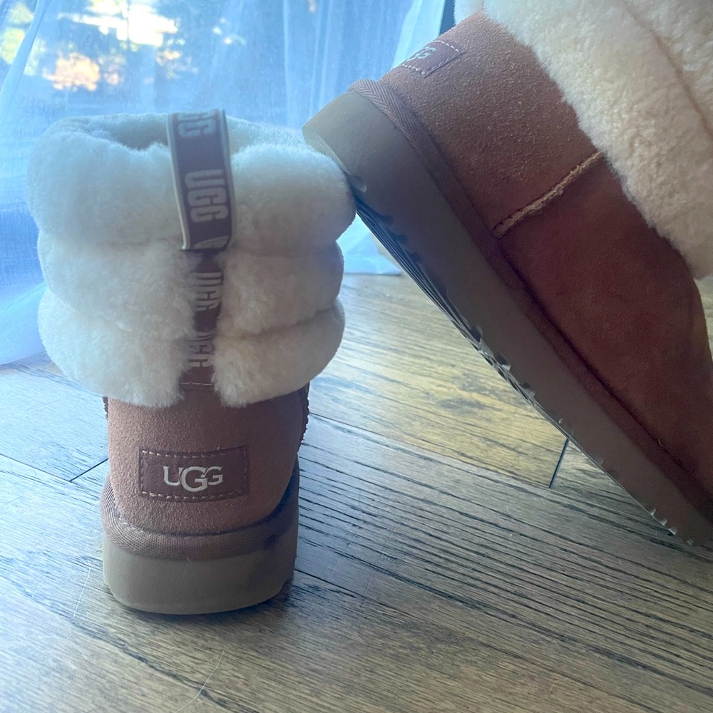 Sand colored Ugg fluff boot
